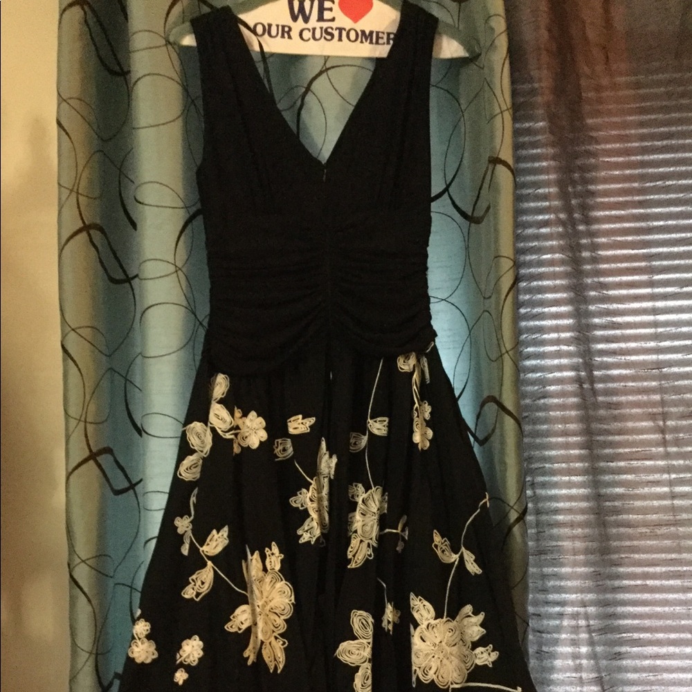 Black dress with white floral embroidery